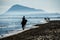 Silhouette of Riders at the beach riding horses