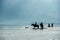 Silhouette of Riders at the beach riding horses