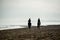 Silhouette of Riders at the beach riding horses