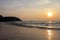 Silhouette rocks at sunset on the seashore or beach