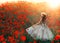 Silhouette romantic happy fantasy woman, back rear view. Girl walks enjoy blooming hill red poppies meadow. Vintage