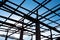 Silhouette Roof structure with steel on the concrete pillars and blue sky