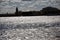 Silhouette of Rostral columns and Arrow of Vasivesky island in Saint-Petersburg, Russia.