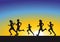 Silhouette of runners at sunrise