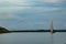 Silhouette of a sailboat on sea against sky during sunset in Shela Beach, Lamu Island, Kenya