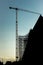 silhouette of scaffolding construction building construction crane