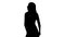 Silhouette of seductive lady posing at camera, fashionable photomodel, back view