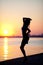 Silhouette of a sensual woman at sunrise perfect