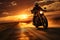 A silhouette shot of a motorcycle rider riding towards a captivating sunset.