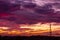 Silhouette signal antenna tower at sunset sky