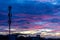 Silhouette signal antenna tower at sunset sky