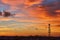 Silhouette signal antenna tower at sunset sky