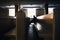 Silhouette of sinful man praying in church seating on pews