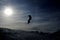 Silhouette of skier jumping