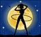 Silhouette of a slender woman doing exercises with hula-hoop