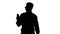 Silhouette Smiling African American businessman making video cal