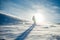 Silhouette of Snowboarder Riding Snowboard in the Mountains at Sunny Day in Snowstorm. Snowboarding and Winter Sports