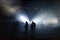 Silhouette of soccer players in stadium lights