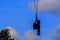 Silhouette Soldier rescue emergency by army helicopter with rope on blue sky