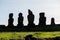 Silhouette of some giant statues of Easter Island. The moai of Ahu Vai Ure, Hanga Roa, Easter Island, Chile