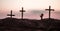 Silhouette some zombies on the cemetery walking around at sunset. Selective focus