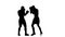 Silhouette of sportsmen training. Two kickboxer sparring