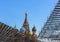 Silhouette of St. Basil`s Cathedral and scaffolding against the blue sky