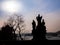 Silhouette statue charles bridge prague czech republic beautiful sky and tree.