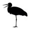 Silhouette of a stork on white background