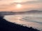 Silhouette of Strandhill beach and surfers waiting for wave in the ocean. Calm and peaceful atmosphere. Sligo, Ireland