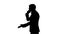 Silhouette Stressed and angry businessman talking on the phone.