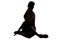 Silhouette of stretching sport coach