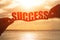 Silhouette of success word