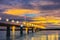 Silhouette sunrise with the beautiful sky in the morning at Thailand, Laos friendship bridge with the bokeh, beam light and lens f