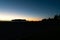 In silhouette before sunrise Leisure island and Main Beach Mount Maunganui