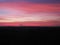 Silhouette sunset sky background. Twilight natural sunset sunrise over forest mountain. Warm color sky orange blue purple