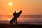 Silhouette Surfer on a misty beach with an amazing sunrise in Japan, Chiba, Katsuura