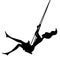 Silhouette of swinging girl