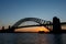 Silhouette of Sydney Harbour Bridge viewed from Kirribilli at sunset