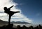 Silhouette of taekwondo girl, adventure and sporty movements in nature