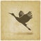 Silhouette of taking flight stork on vintage background