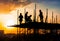 Silhouette of teamwork construction crew, building construction worker working togetherat site