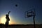 Silhouette of a Teen Boy shooting a Basketball