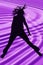 Silhouette Teen Jumping Over Purple