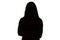 Silhouette of teenage girl with arms crossed