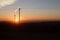 Silhouette of telecommunication poles on a cold South African morning