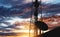 Silhouette Telecommunication tower with Satellite dish, under sunset sky