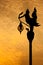 Silhouette Thai art statue lamppost in the evening