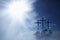 Silhouette of three crosses on a rocky hill against dramatic sky background and symbolize the Crucifixion and resurrection of