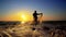 Silhouette of traditional fishermens pulling net fishing at ocean